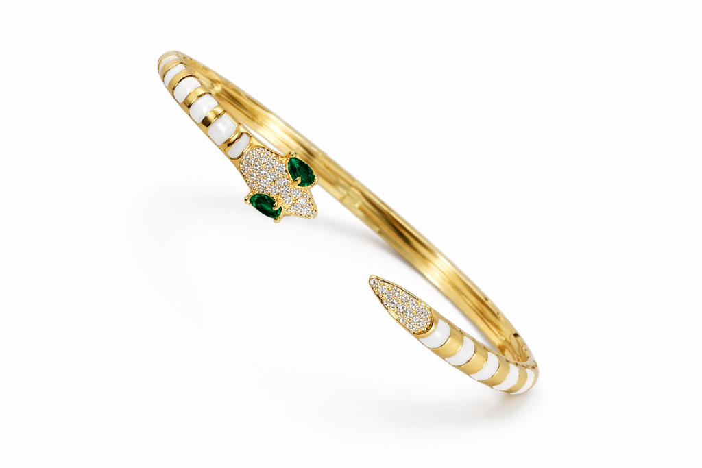 anti-tarnish bracelet, comfort jewellery, demi-fine jewellery bracelet, 18kt gold tone bracelet, snake bracelet for women, luxury bracelet for women, designer bracelet for women, anti-tarnish jewellery bracelet, statement bracelet for women.Anti-tarnish 18KT gold tone snake bracelet for women with American diamonds and emerald stones – comfort jewellery by Ashaarya