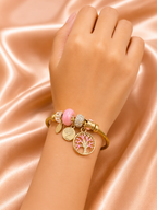 Blossom Tree Charm Bracelet by Ashaarya featuring Tree of Life charm, pink enamel flower charm, crystal beads, anti-tarnish finish, lightweight comfort jewellery for women.