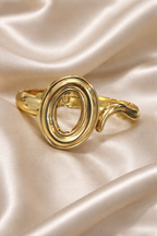 ashaarya, gold bracelet, ashaarya jewels, ashaarya jewellery, charm bracelets, gold bracelet on satin background