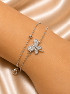 The Becoming Bracelet by Ashaarya featuring a sparkling silver butterfly charm on a dual-chain anti-tarnish 316L stainless steel bracelet for women.