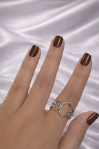 Silver rings for girls duo set anti-tarnish finish with statement band ring and linked ring design on hand, Hand wearing a silver ring with a white satin background